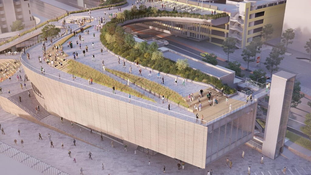 A rendering of the Ocean Pavilion's rooftop space: A large, J-shaped roof with walkways, trees, bushes, and other plants.