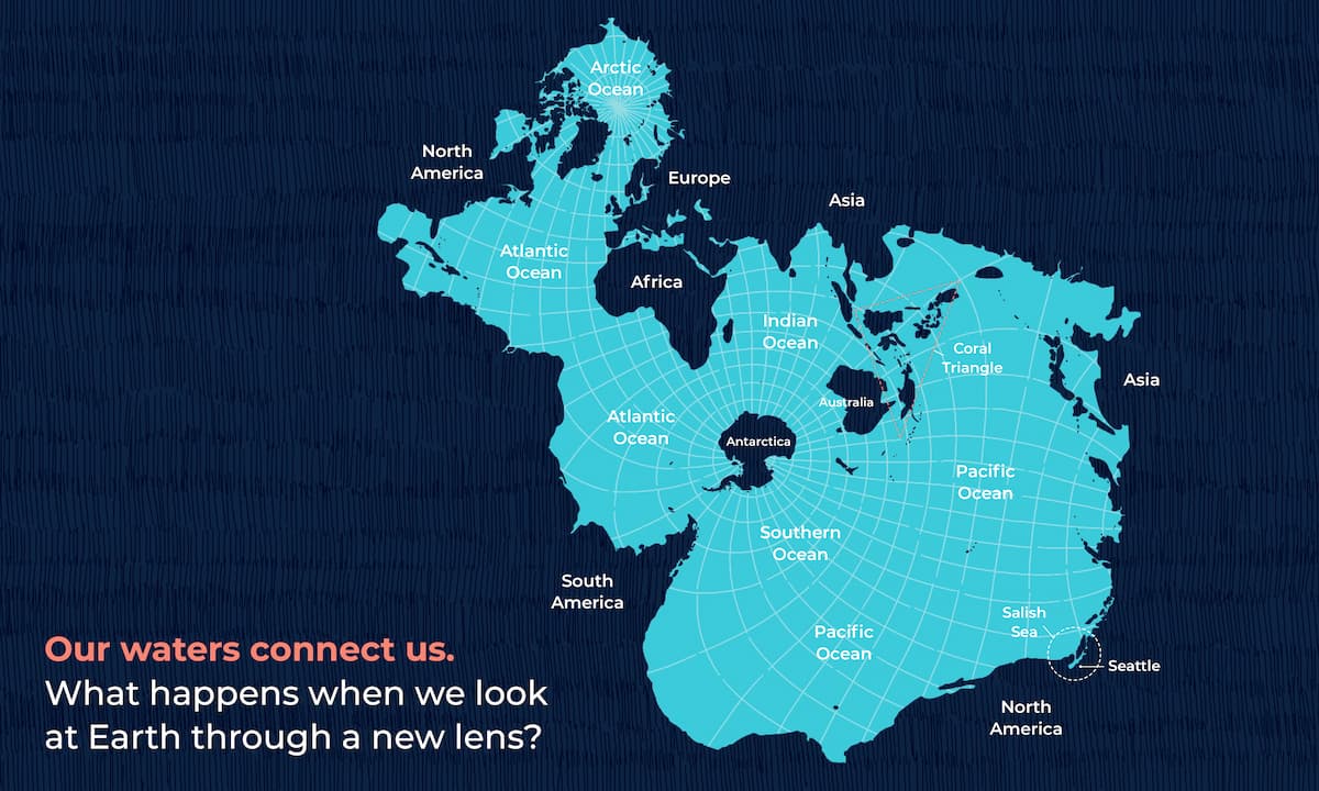 An illustration of the Spilhaus projection, an alternative world map that centers our ocean instead of landmasses. The oceans and landmasses are labeled, with Seattle and the Salish Sea circled in the bottom right. Text in the bottom left corner of the image reads "Our waters connect us. What happens when we look at Earth through a new lens?"