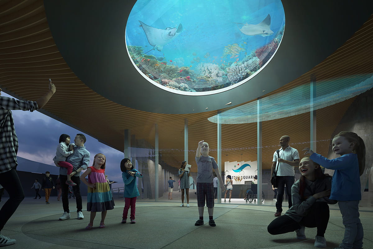 Concept rendering of visitors outside the Seattle Aquarium's future Ocean Pavilion building, looking up at the Oculus, a round glass window into a tropical habitat inside the Ocean Pavilion.