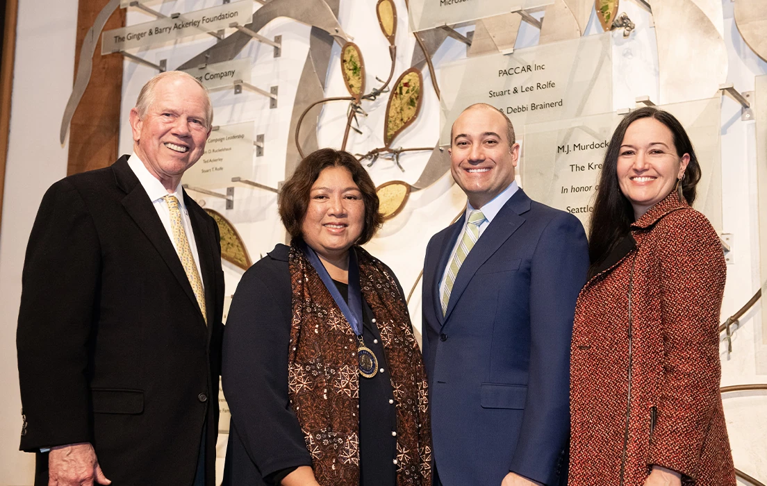Bob Davidson, Rili Djohani, Michael Guidon, and Dr. Erin Meyer pose for a photo during Seattle Aquarium's 2024 Ocean Conservation Honors event.