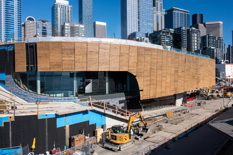 Exterior of the Seattle Aquarium's new Ocean Pavilion, viewed from the side to showcase new cedar wood planks which cover the west side of the building.