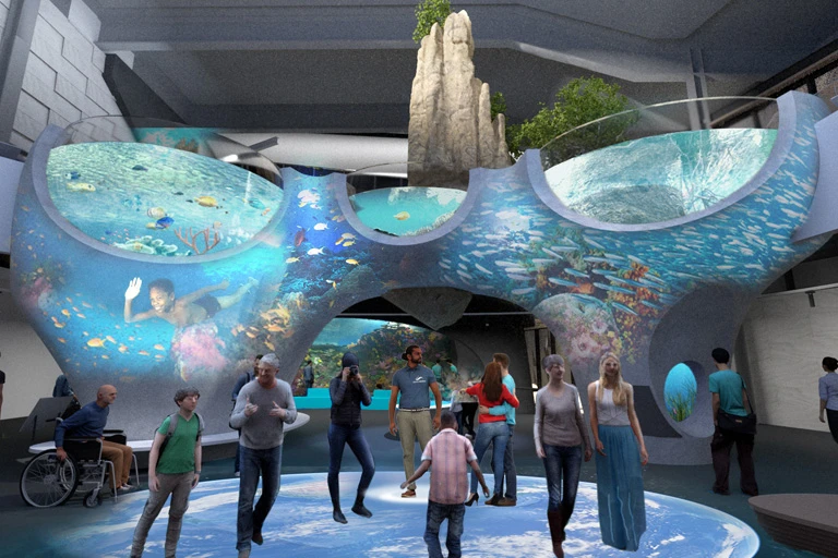 Rendering showing guests inside the Ocean Pavilion's new One Ocean Hall space, with views into different habitats and interactive videos playing along the walls and floor.