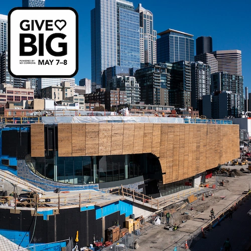 West exterior of the Seattle Aquarium's new Ocean Pavilion building, showcasing a large wall of cedar wood planks while the building is under construction. GiveBIG powered by 501 Commons, May 7-8.