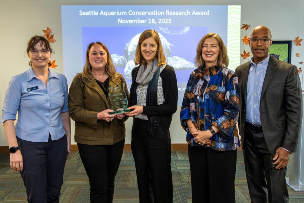 Dr. Harris receiving the Seattle Aquarium Conservation Research Award.