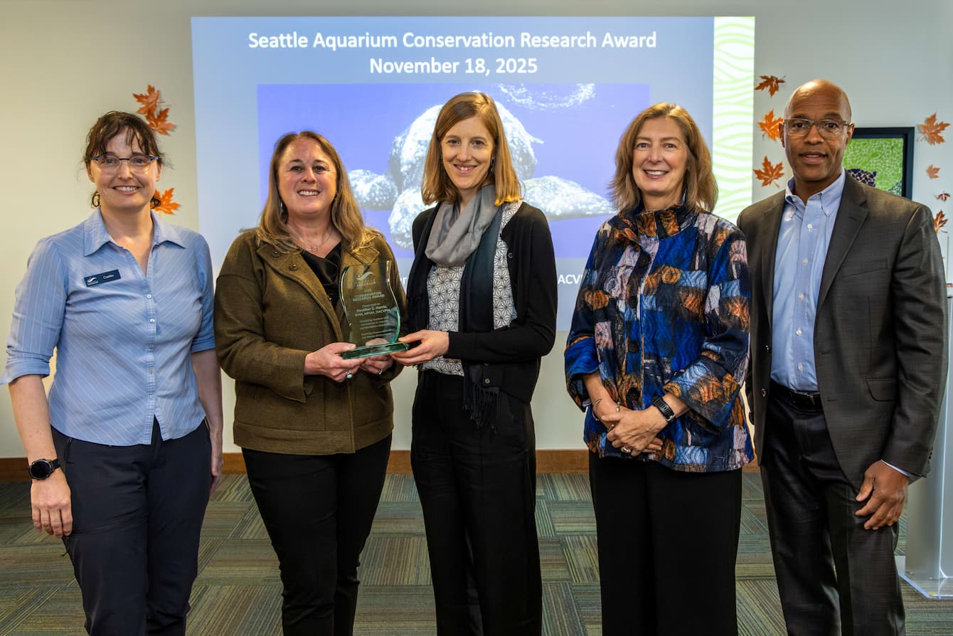 Dr. Harris receiving the Seattle Aquarium Conservation Research Award.