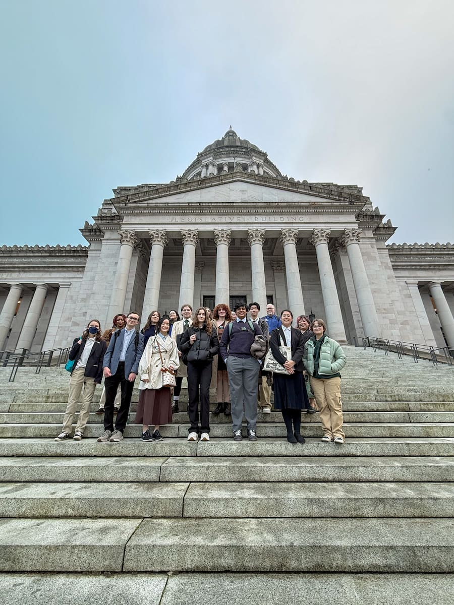 Youth Ocean Advocates standing on the steps of the Capitol Building.