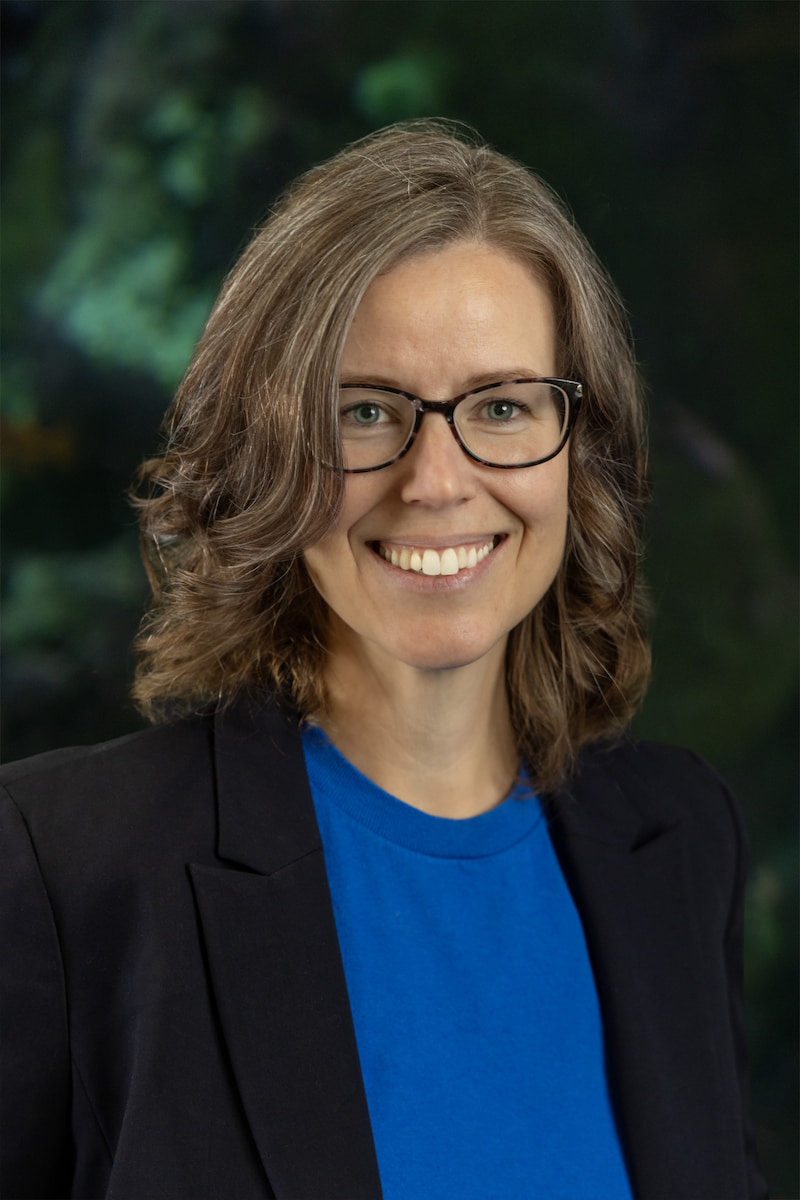 Meg standing in front of the Window on Washington Waters habitat.